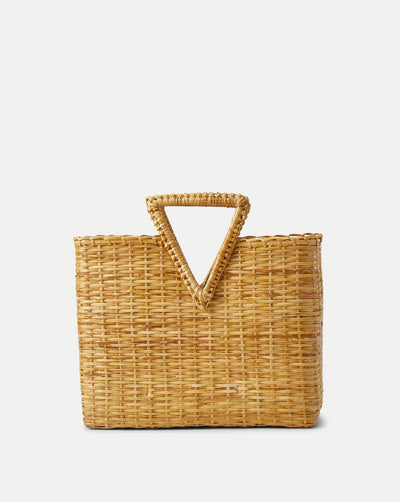 Veronica Beard Natural woven straw tote bag with a triangular top handle.