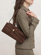 Veronica Beard Brown suede shoulder bag with gold hardware.