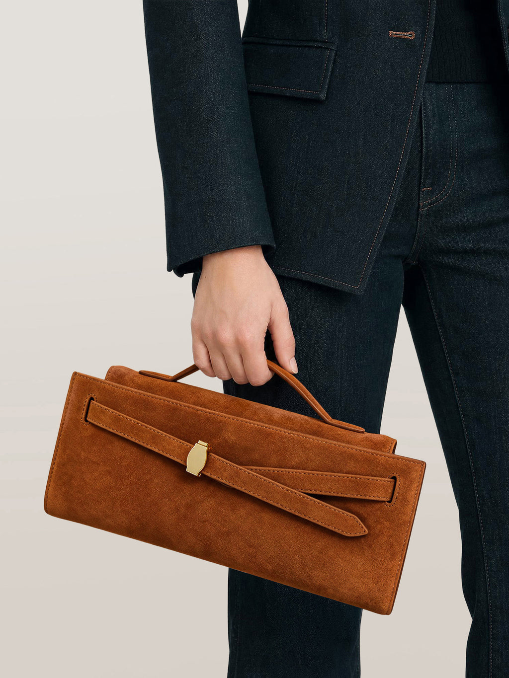 Veronica Beard Brown suede clutch with gold clasp.