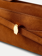 Veronica Beard Brown suede clutch with gold clasp.