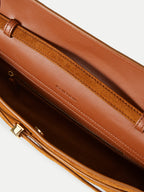 Veronica Beard Brown suede clutch bag with top handle.