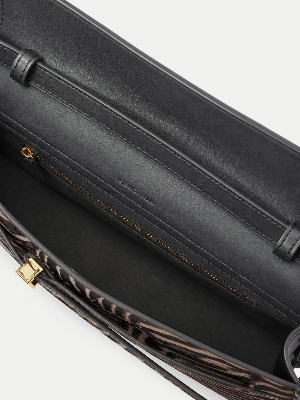 Veronica Beard Black leather handbag with gold zipper and hardware.