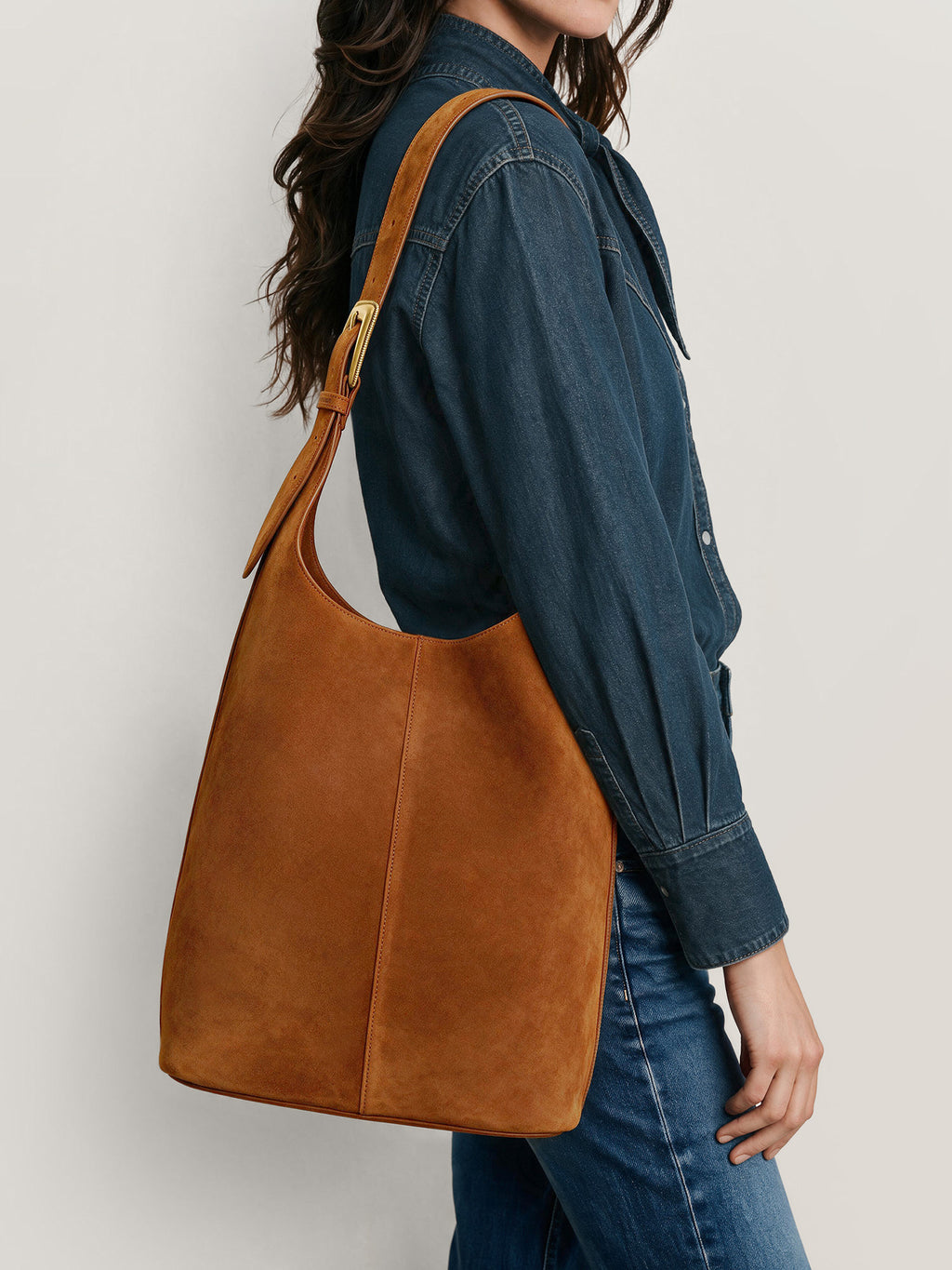 Veronica Beard Brown suede slouchy shoulder bag with gold hardware.