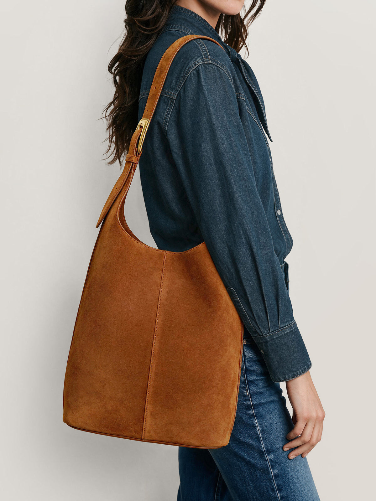 Veronica Beard Brown suede slouchy shoulder bag with gold hardware.