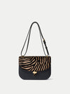 Veronica Beard Black leather and zebra print calf hair shoulder bag.