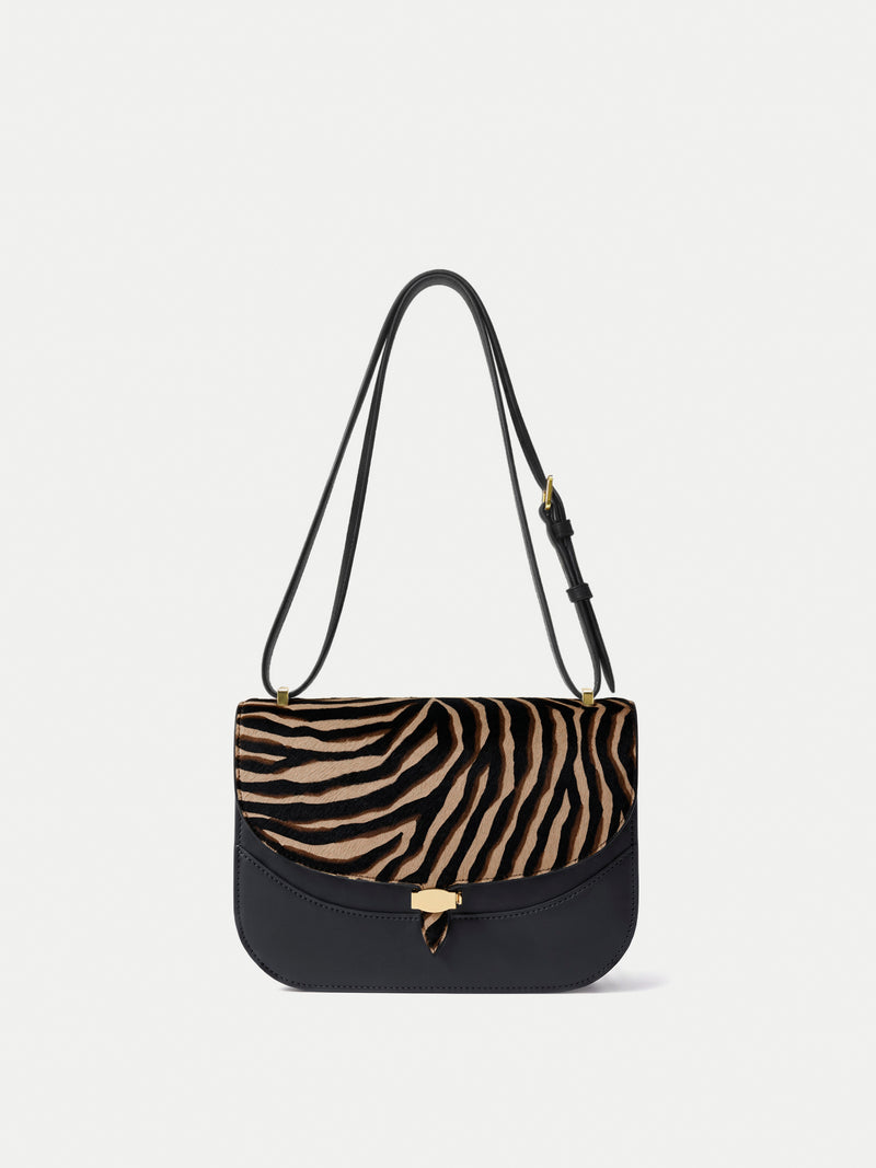Veronica Beard Black leather and zebra print calf hair shoulder bag.