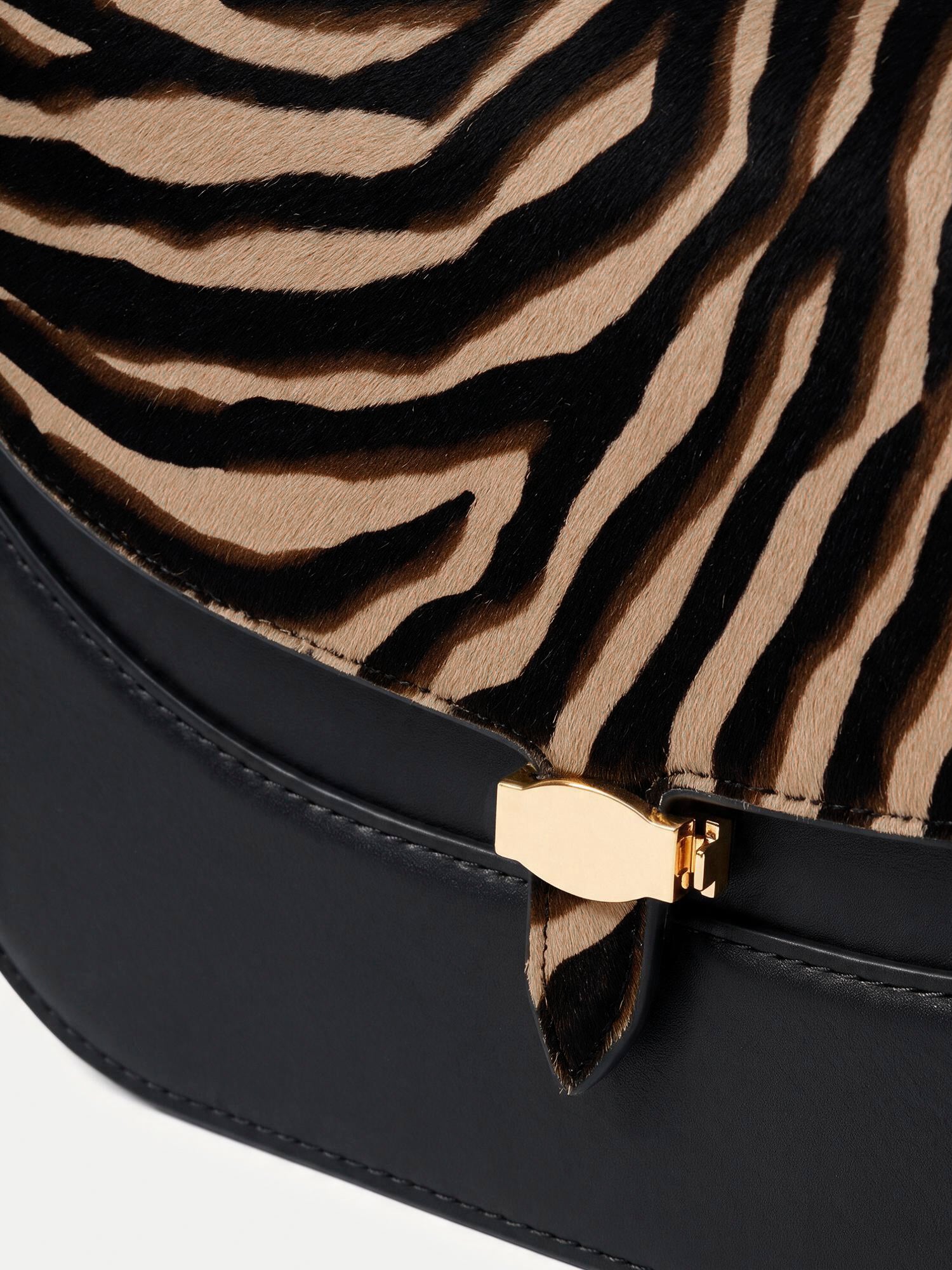 Veronica Beard Black and zebra-print leather shoulder bag.