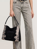 Veronica Beard Black suede and snakeskin hobo bag with braided strap.