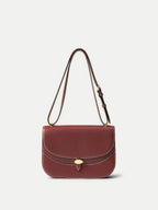 Veronica Beard Burgundy leather shoulder bag with gold hardware.