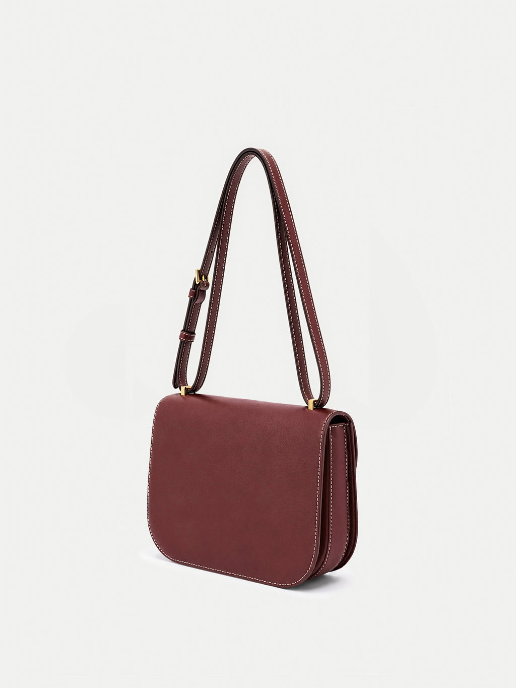Veronica Beard Burgundy leather structured crossbody handbag with white stitching.
