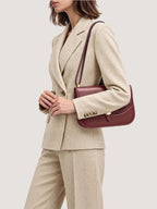 Veronica Beard Beige linen double-breasted blazer and trousers suit.