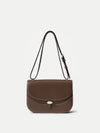 Veronica Beard Brown leather shoulder bag with white topstitching.