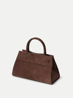 Veronica Beard Brown suede handbag with top handle and side straps.