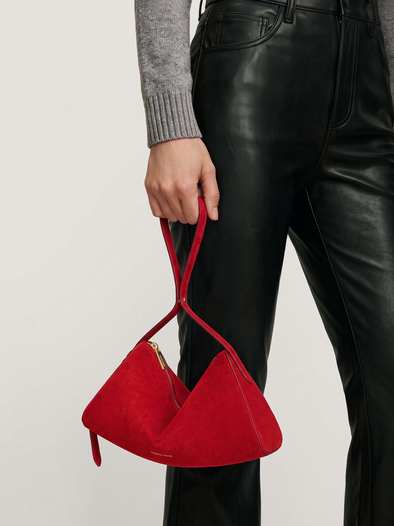Veronica Beard Red suede structured handbag with gold zipper.