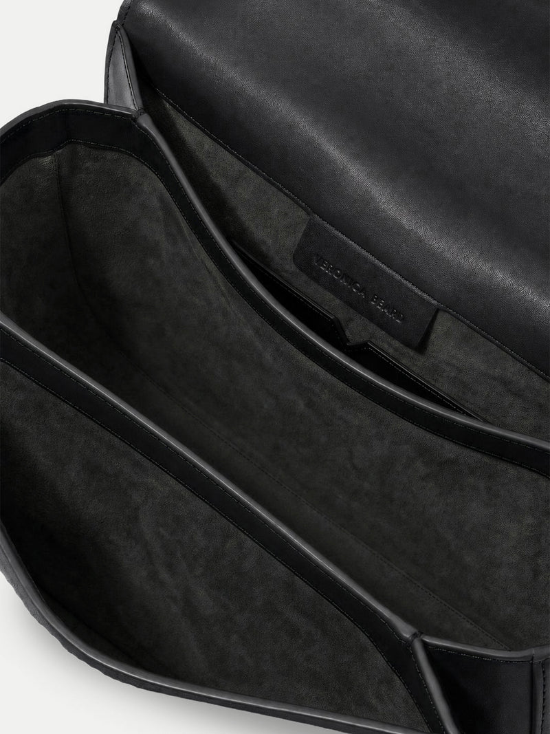 Veronica Beard Black leather shoulder bag interior with suede lining.