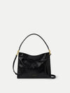 Veronica Beard Black patent leather shoulder bag with gold hardware.