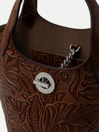 Veronica Beard Brown embossed leather handbag with silver-tone hardware.