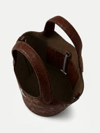 Veronica Beard Brown embossed leather bucket bag with top handles.