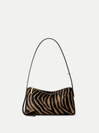 Veronica Beard Zebra print calf hair shoulder bag with gold zipper.