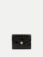 Veronica Beard Black crocodile embossed leather wallet with gold snap closure.