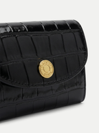 Veronica Beard Black crocodile-embossed leather wallet with gold button closure.