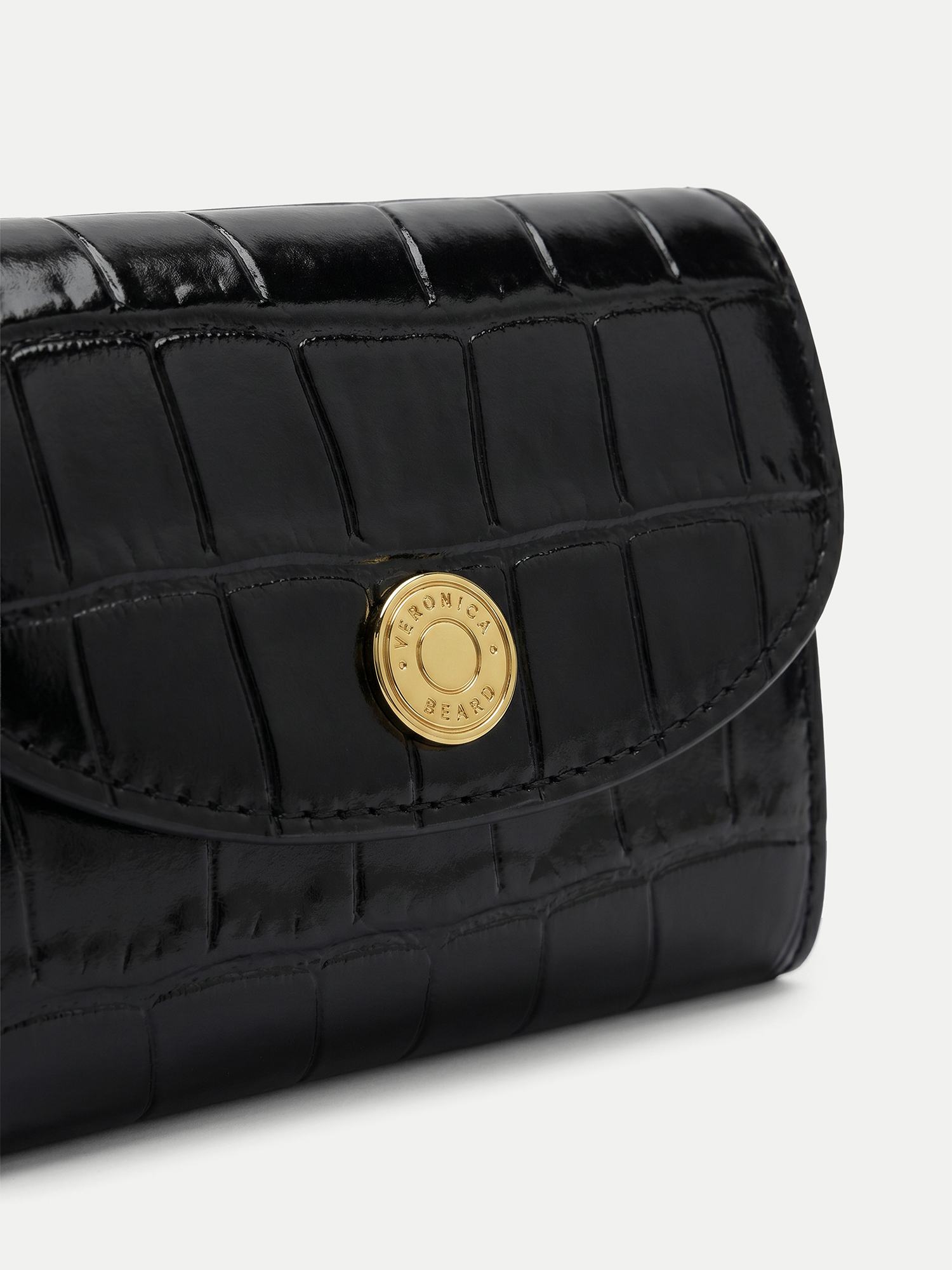 Veronica Beard Black crocodile-embossed leather wallet with gold button closure.