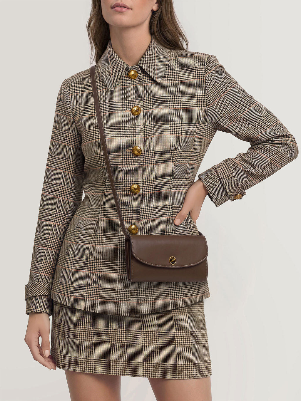 Veronica Beard Brown leather shoulder bag with gold clasp.