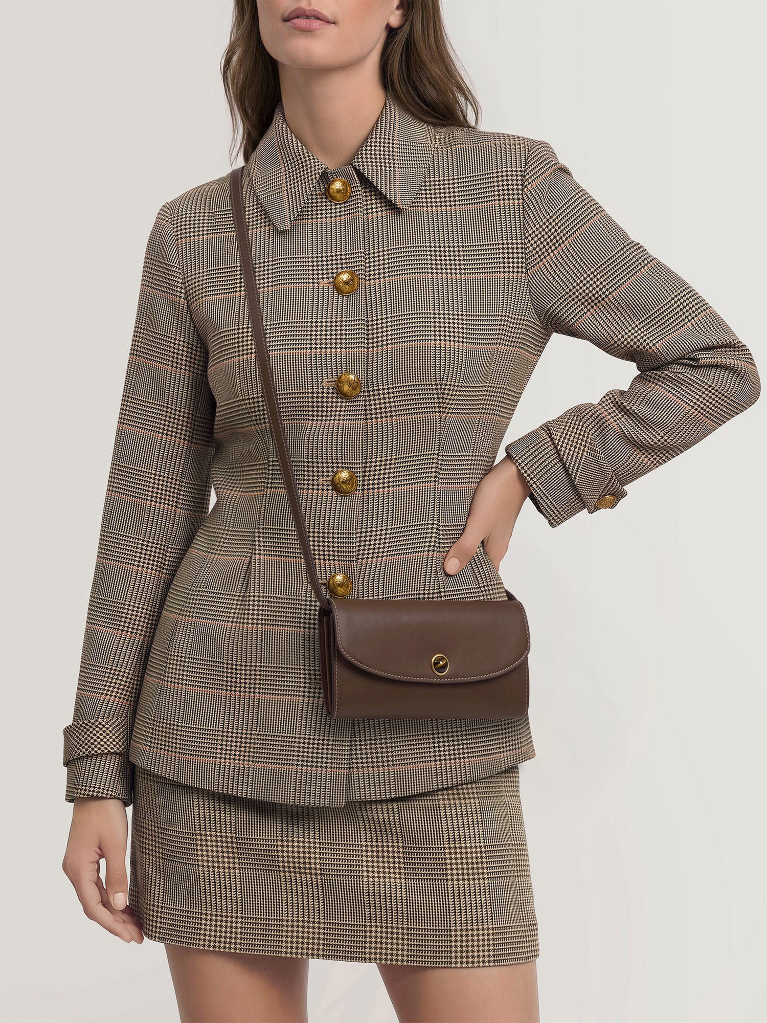 Veronica Beard Brown leather shoulder bag with gold clasp.
