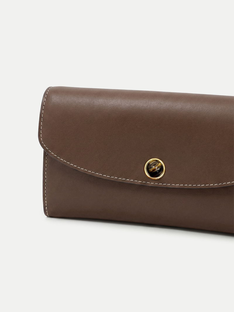 Veronica Beard Brown leather wallet with gold and tortoise shell snap closure.