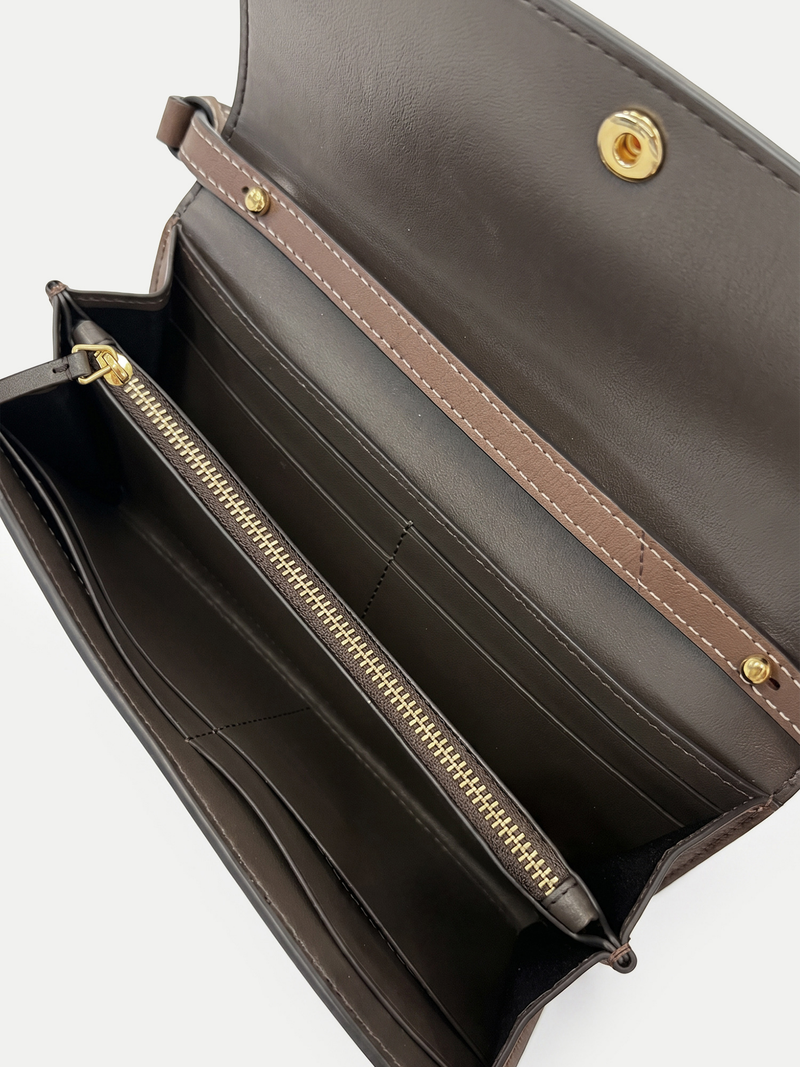 Veronica Beard Brown leather wallet with gold zipper and snap closure.