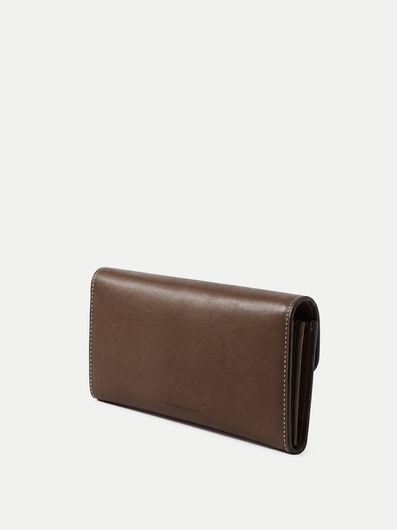 Veronica Beard Brown leather wallet with white stitching.