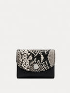 Veronica Beard Black and white snakeskin print wallet with silver snap closure.