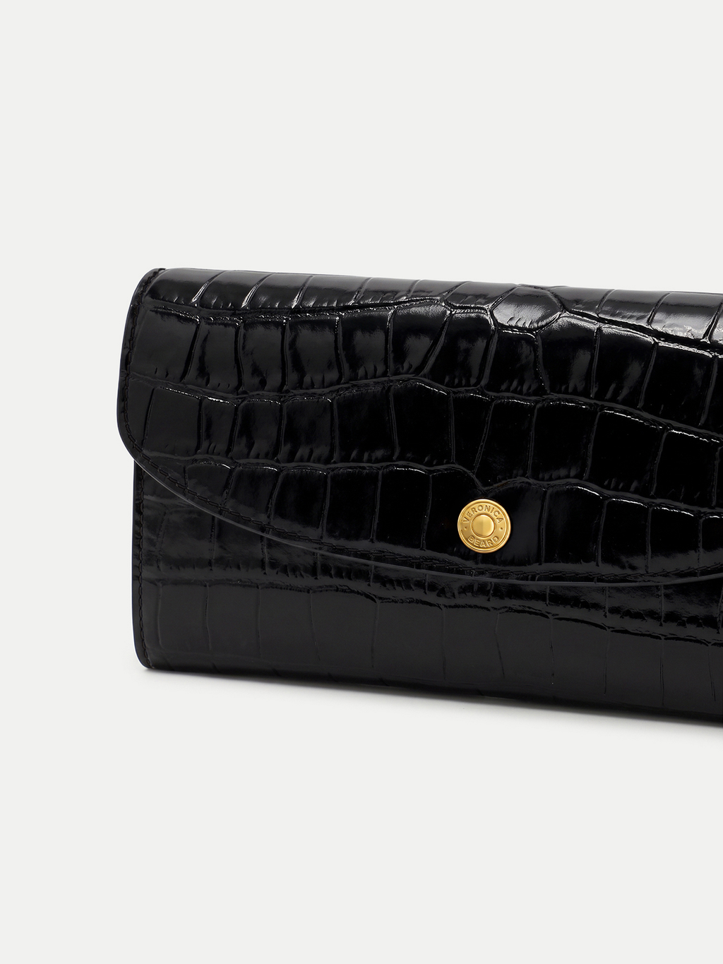 Veronica Beard Black crocodile-embossed leather wallet with gold snap closure.