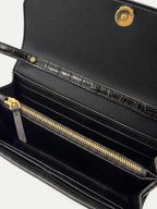 Veronica Beard Black crocodile-embossed leather wallet with gold zipper.