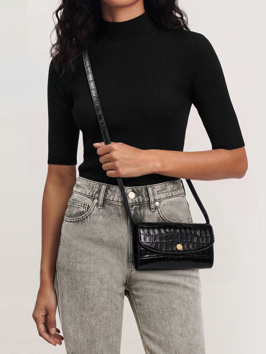 Veronica Beard Black mock-neck fitted knit top.