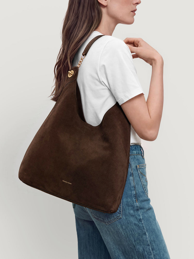 Veronica Beard Brown suede hobo bag with gold hardware.