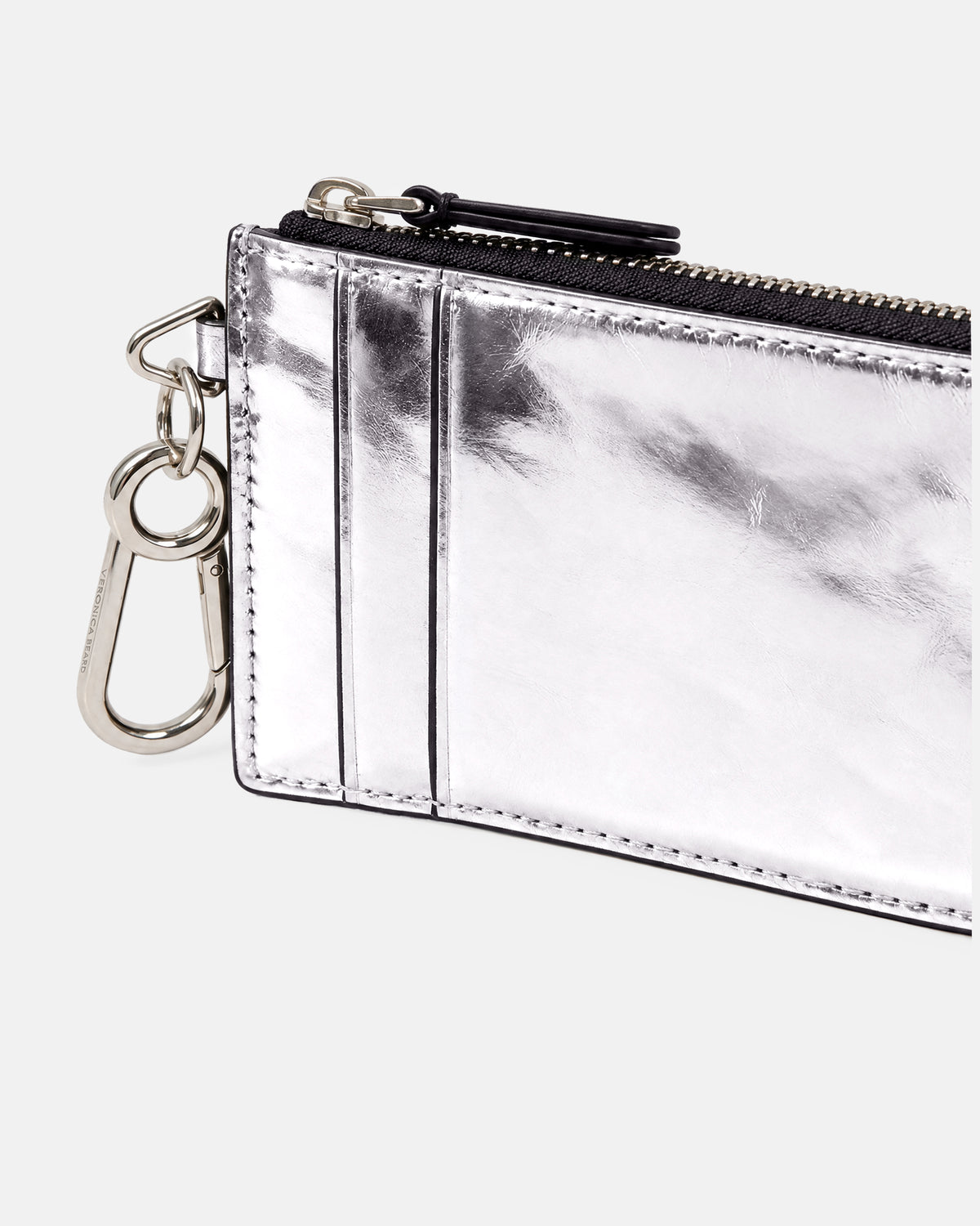 Veronica Beard Metallic silver leather card holder with silver hardware.