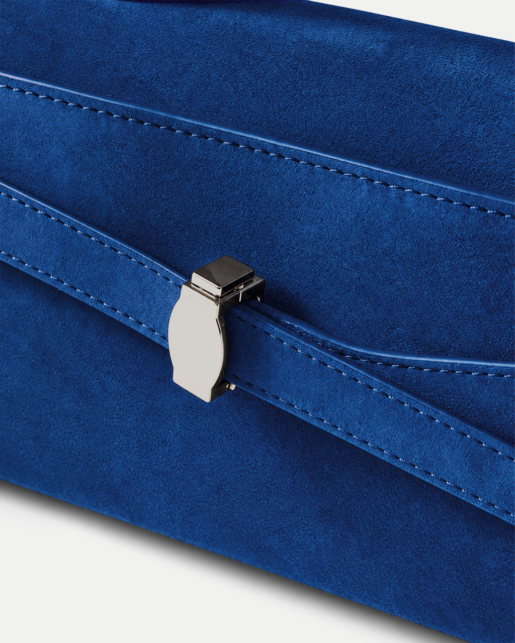 Veronica Beard Blue suede handbag with silver metal clasp.