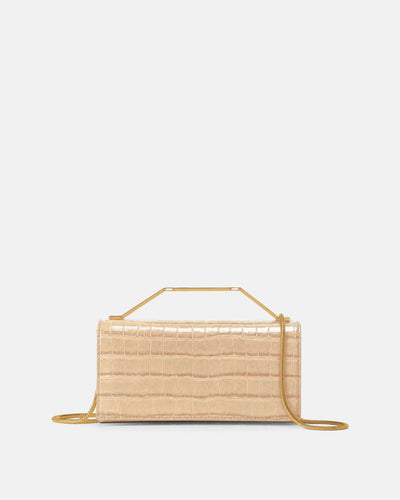 Veronica Beard Beige embossed leather handbag with gold handle and chain.