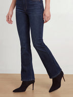 Veronica Beard Black suede pointed-toe ankle boots with high heels.