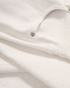 Veronica Beard White denim jeans with a classic five-pocket design and silver-toned hardware.
