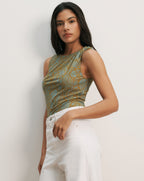 Veronica Beard Sleeveless teal and gold paisley print top with a draped neckline.