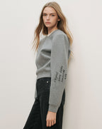 Veronica Beard Gray cotton sweatshirt with black embroidered text on the left sleeve.