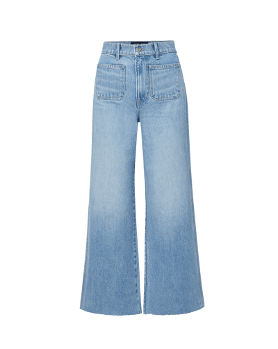 Veronica Beard Light wash denim wide-leg jeans with large front patch pockets.