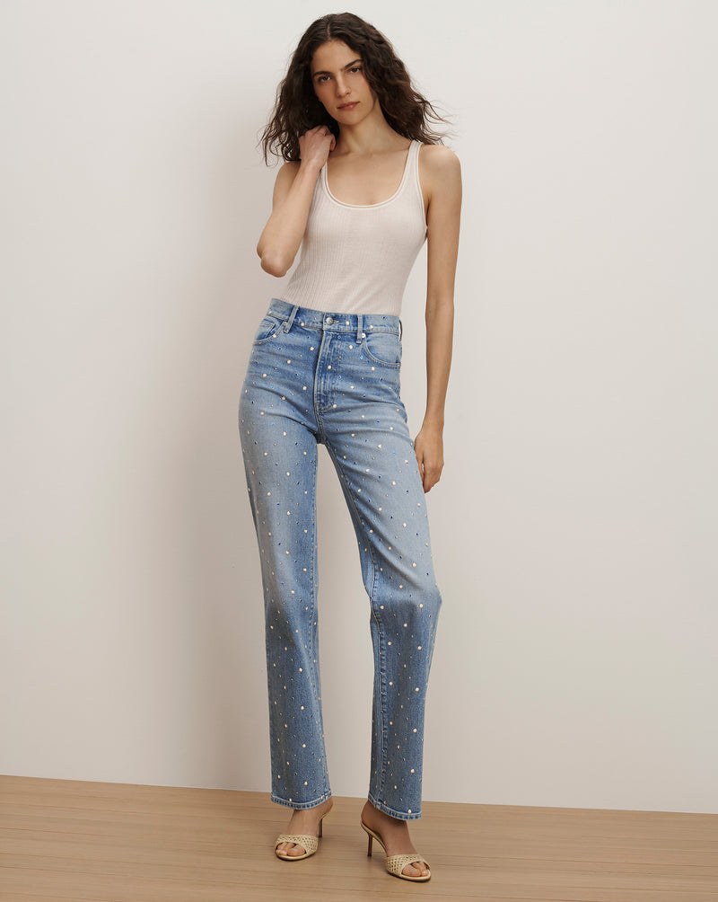 Veronica Beard Light wash straight-leg jeans with all-over pearl embellishments and a cream ribbed tank top.