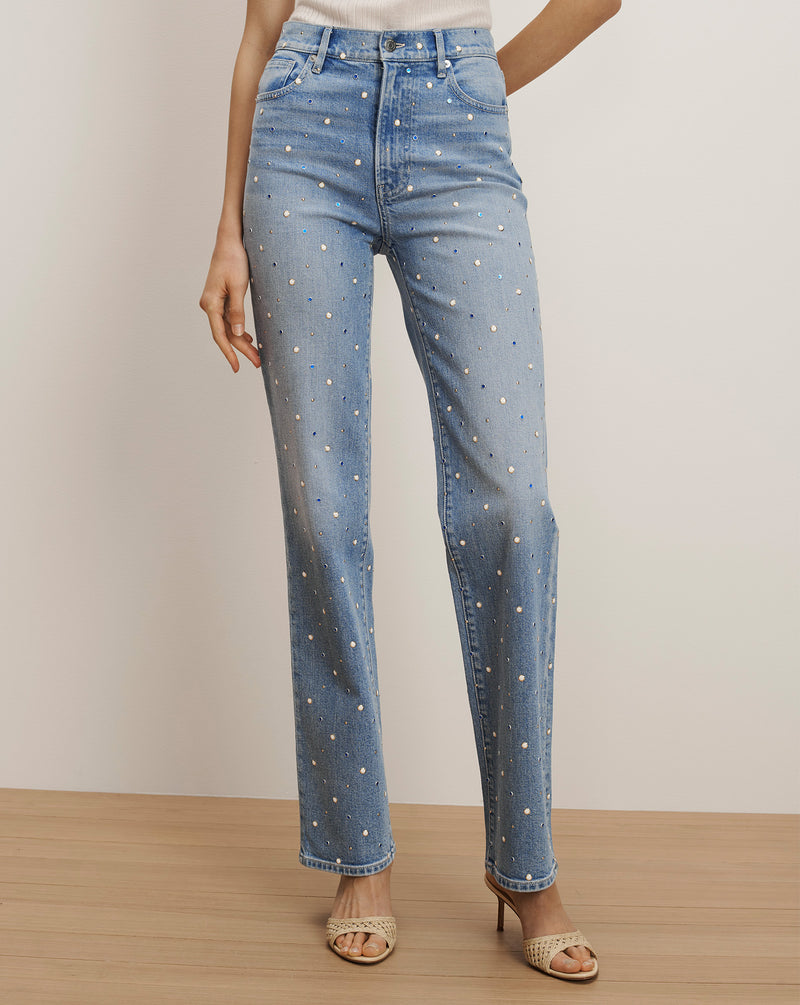 Veronica Beard Light wash denim jeans with scattered pearl embellishments.