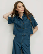 Veronica Beard Blue denim short-sleeve button-up top with pockets.