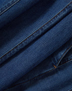 Veronica Beard Blue denim pant with tan stitching.