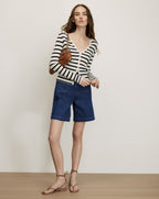 Veronica Beard Blue denim Bermuda shorts with front patch pockets.