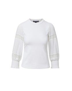 Veronica Beard White long-sleeve top with lace inserts and shirred cuffs.